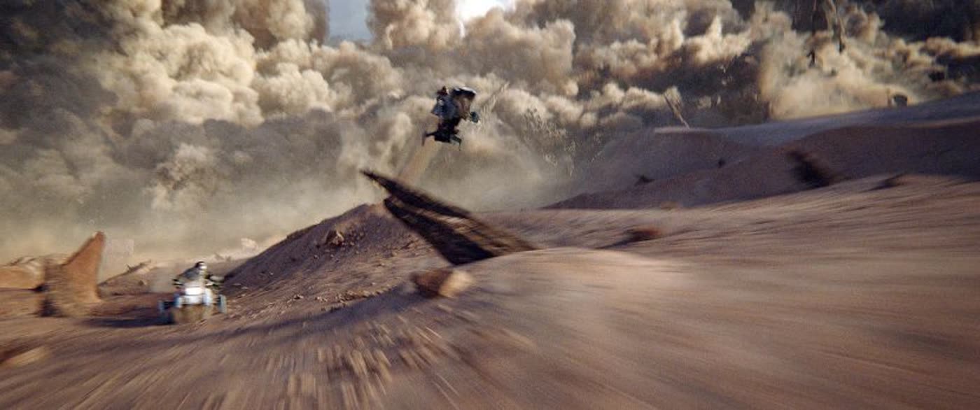 A shuttle craft racing low over a dust-blown alien surface, from Star Trek: Discovery.